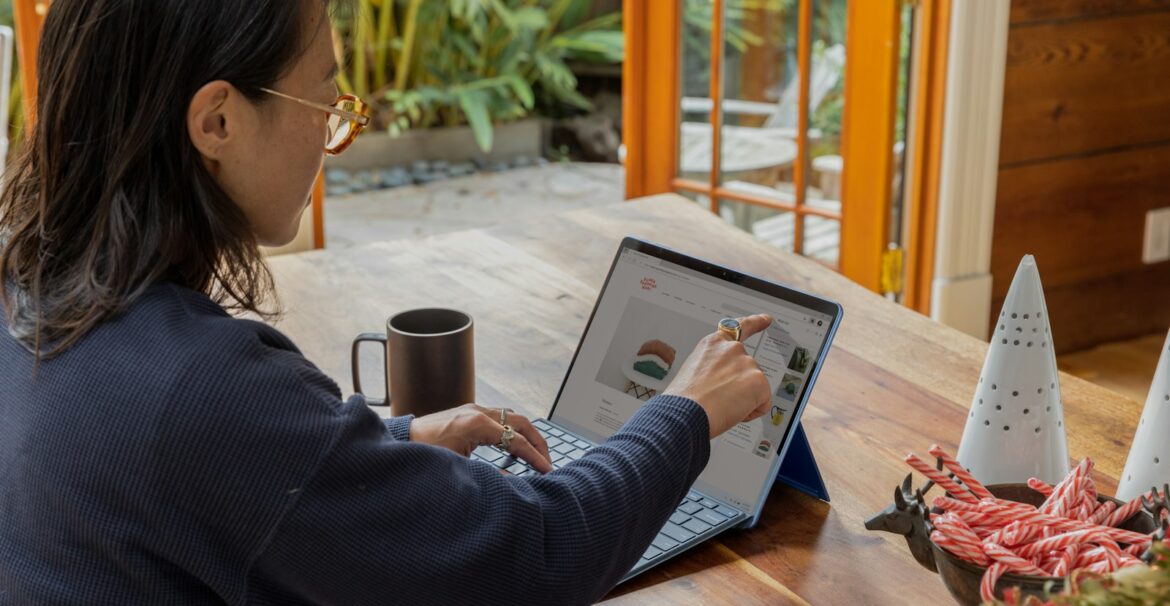 a woman using a laptop